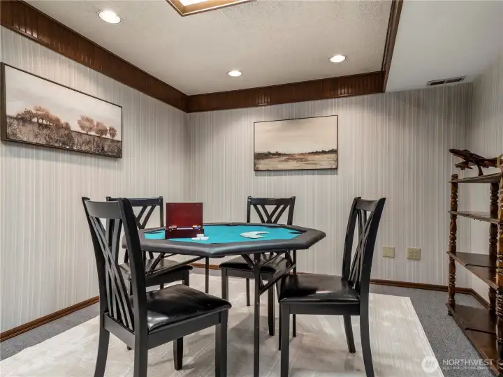 Downstairs features a huge game room.