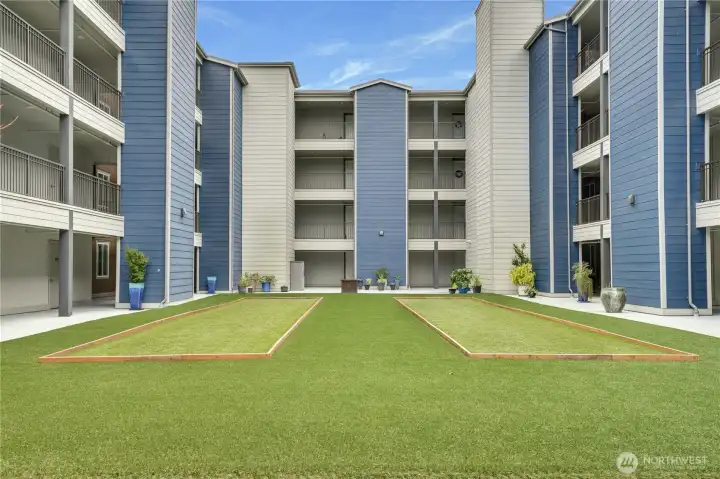 Step outside your door to enjoy community amenities including a putting green and bocce ball court.