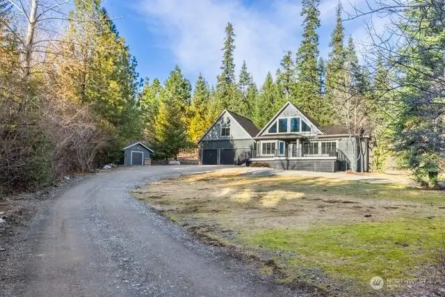 Immaculate home on 4.43 acres with large circular driveway