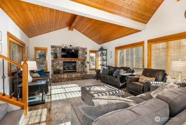 Cozy living room with rock fireplace