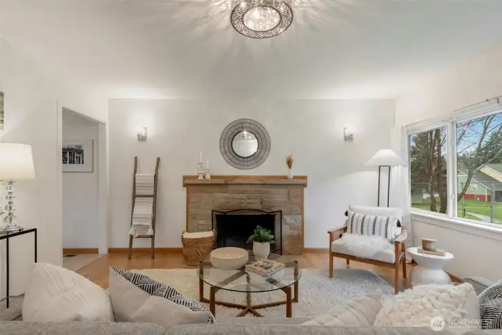 Cozy wood burning fireplace.