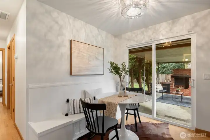 Dining with built in dining bench with direct access to the covered patio.