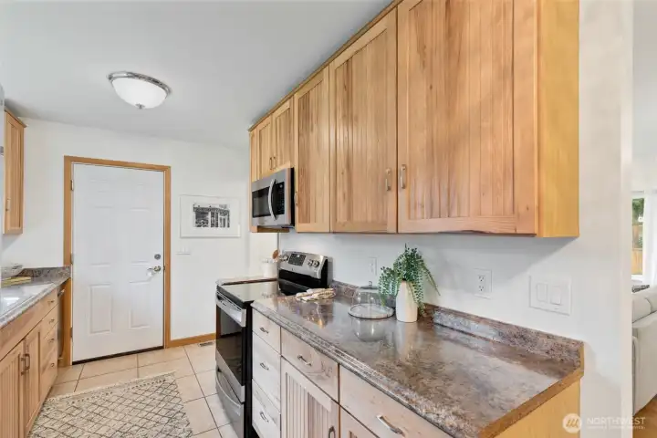 Direct access into the kitchen from attached 1 car garage.