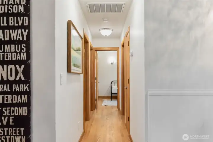 Hallway to bedrooms and bathroom.
