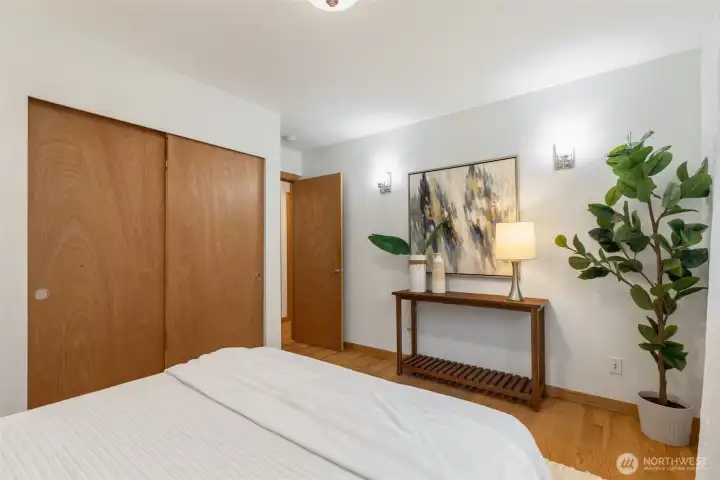 Primary bedroom looking at door.