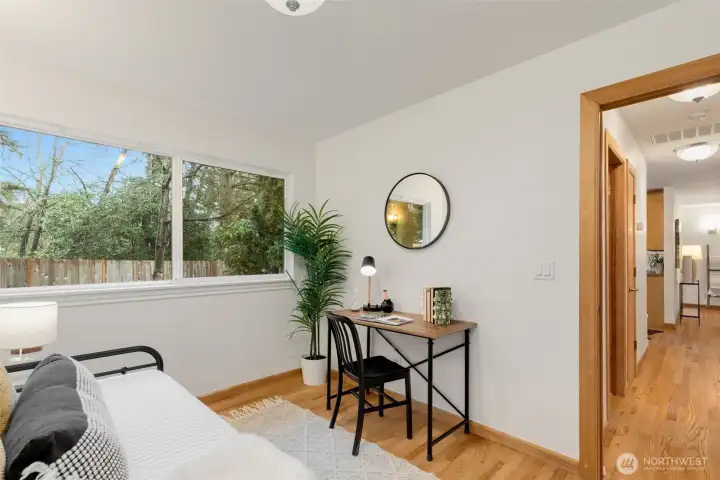 Bedroom at the back of the house with window overlooking the back yard.