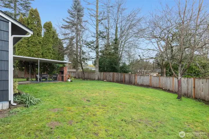 Spacious yard which backs up to green space.  Property line is all the way up to the creek back behind the back gate.