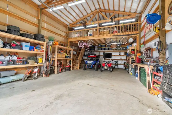 Detached garage with wood burning stove & large loft space
