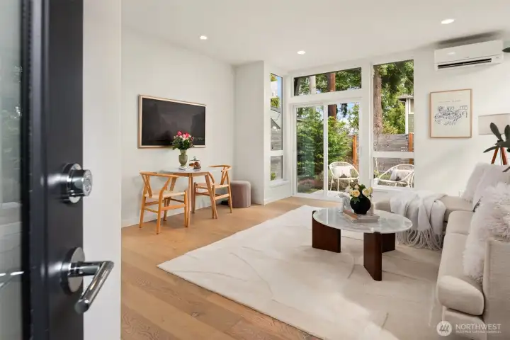 Inside, the vibe is clean, current, and effortlessly livable. Natural light pours in, the layout feels open without wasting space, and the main floor connects beautifully to a landscaped fenced yard with patio access that makes indoor-outdoor living feel easy and natural.