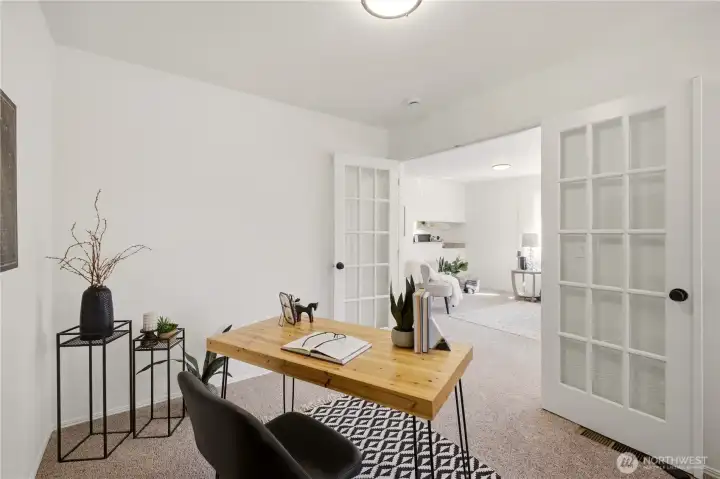 Shown here is the front bedroom, staged as a home office. It could also be a craft room or home library.