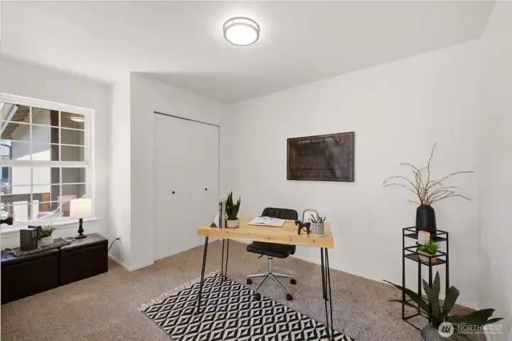 Convenient storage in the corner closet, and a view overlooking the front porch and front yard.