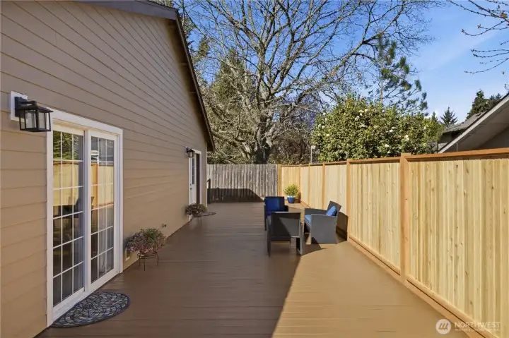 The newly installed privacy fence enables pets and little ones to stay safe and enclosed.