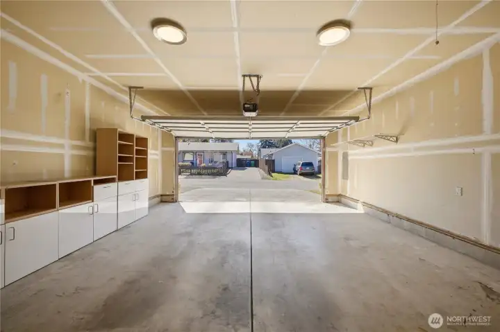 The garage is clean and ready for your vehicle storage, hobbies, workbench, or tool chests!