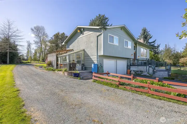 Greenhouse with water catchment system for easy watering.