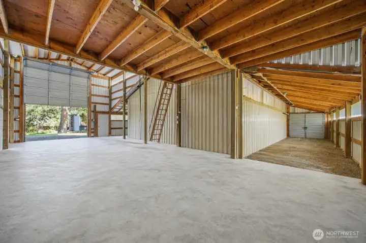 Horse barn with 11X11 ft door.