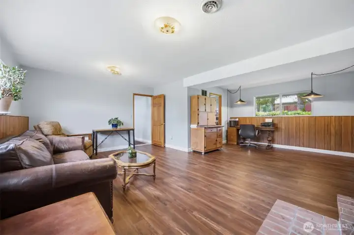 Large Daylight basement with plenty of space for a home office and a secondary living room.