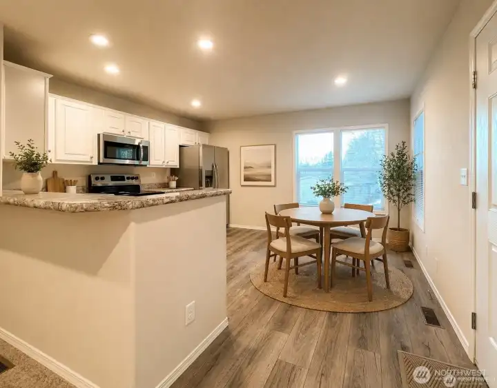 Eat in kitchen virtually staged with dining set - perfect for slow mornings and eveings spent together!