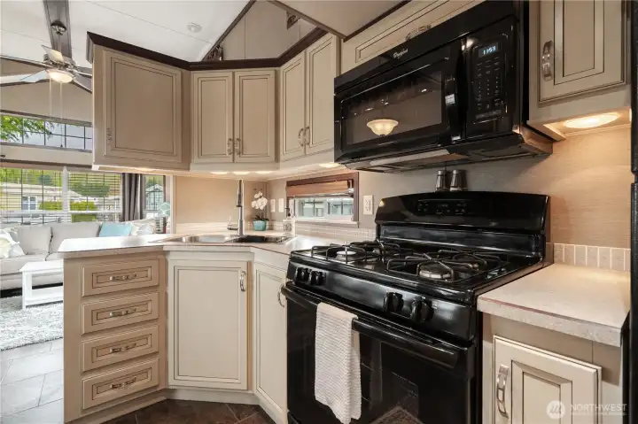 Kitchen is open to the living room, allowing for easy conversations while preparing your meals.