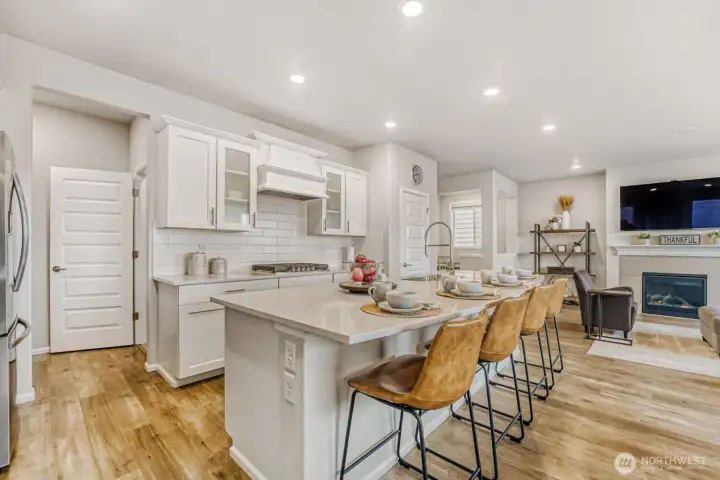 Extra large kitchen island with ample seating for four.