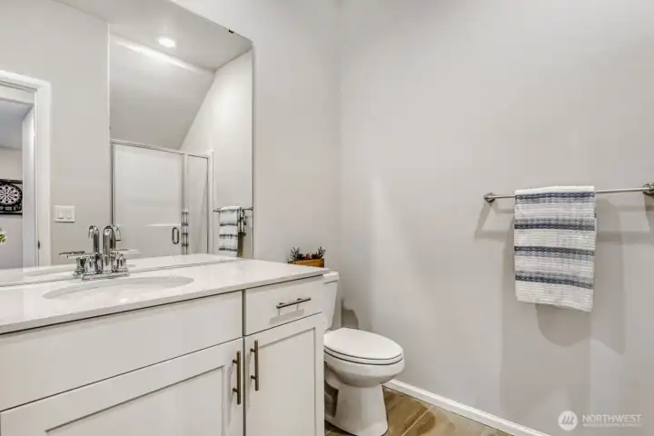 Lower level 3/4 bath adjacent to bedroom 5.