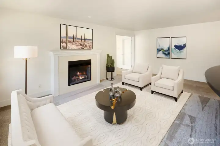 Spacious living area with open layout and access to the den for flexible living