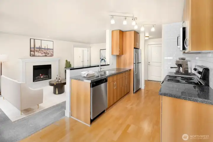 Open kitchen seamlessly connected to the living spaces- great for everyday living and entertaining!