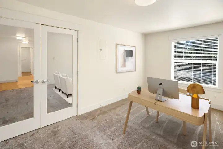 Another view of the bright and spacious den