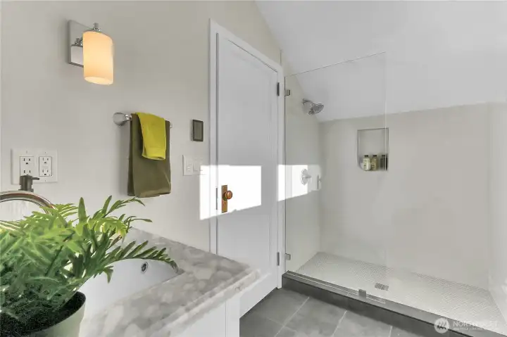 3/4 bath located in the walk-in closet of the Primary Suite.