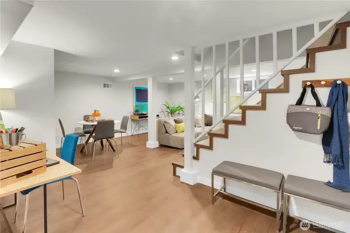 All the way downstairs you'll find a perfect entertainment or game space, with room for the sofa and TV.