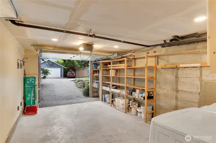 Garage and laundry accessed from the lower level. Note the 3 extra parking spots off the alley entry.