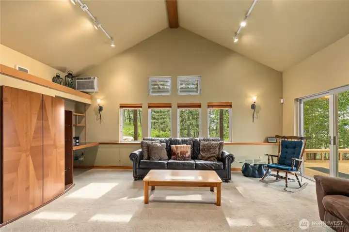 The living area from another angle, emphasizing its bright and comfortable atmosphere.