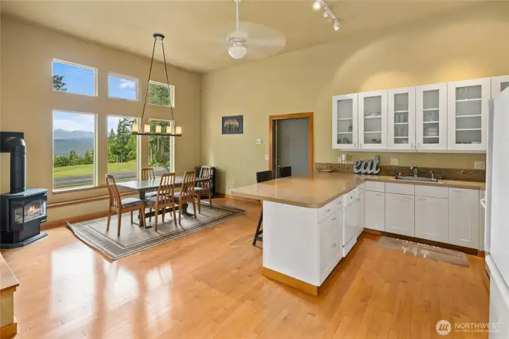 Open kitchen and dining spaces offer a functional layout and easy flow for gatherings.