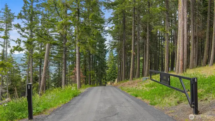 Gated entry adds character and a sense of arrival to this unique property.