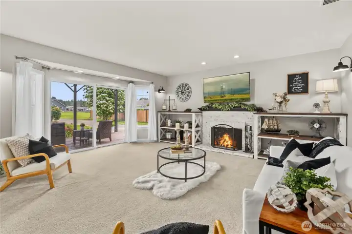 Family room with wood burning fireplace Family room with wood burning fireplace