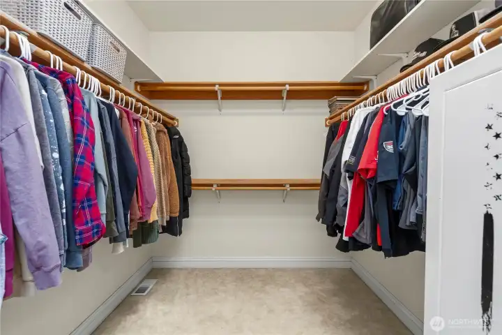 Primary walk-in closet Primary walk-in closet