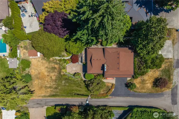 This home sits on a .37 acre corner lot and deeded access to the serene private Lake Burien. This home sits on a .37 acre corner lot and deeded access to the serene private Lake Burien.