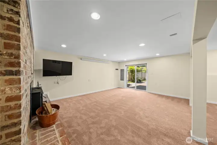 The lower level bonus room also has direct access to the outside patio and park-like gardens. The lower level bonus room also has direct access to the outside patio and park-like gardens.