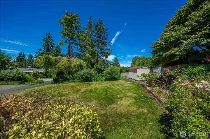 Today's beautiful level lawns also provide space for a potential DADU. Today's beautiful level lawns also provide space for a potential DADU.