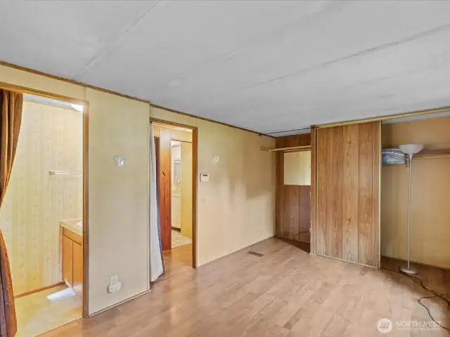 Primary Bedroom with a powder room.