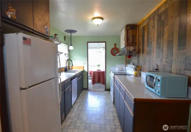 Convenient kitchen with access to the dinning room and from the other a separate fam. room...