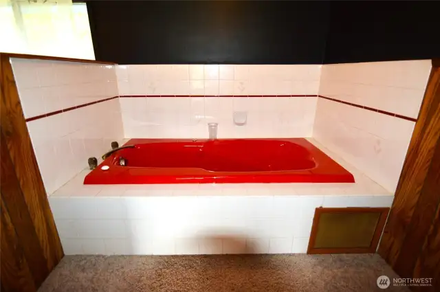 Separate jacuzzi tub.