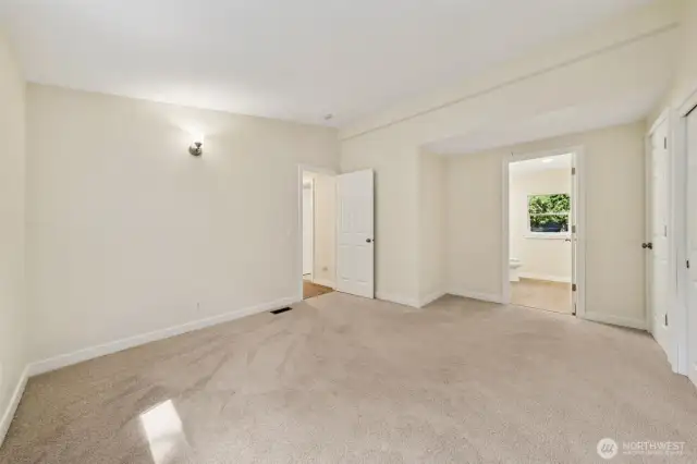 Primary bedroom with attached full bath- NEW carpet, trim & paint!