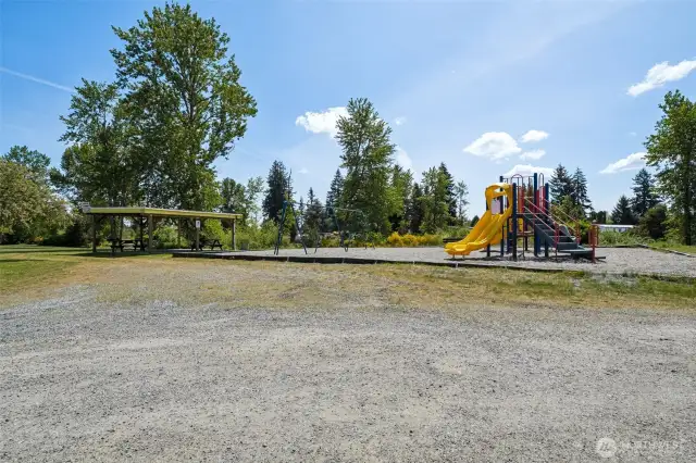 Neighborhood playground with picnic area.