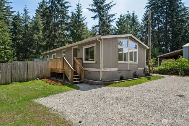 Newly landscaped .22 acre level lot!