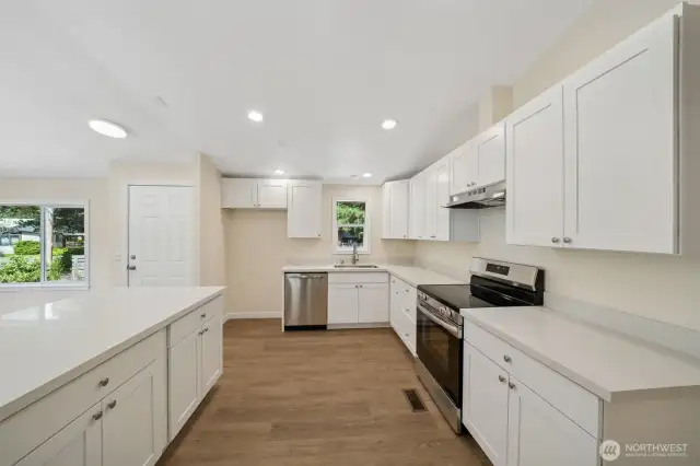 NEW, NEW, NEW- be the first to cook in this kitchen- white shaker cabinets, LOTS of countertop space, stainless steel appliances & LVP flooring!