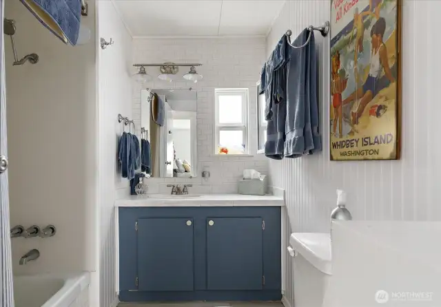 Just down the hall, you'll find the cutest full bath.