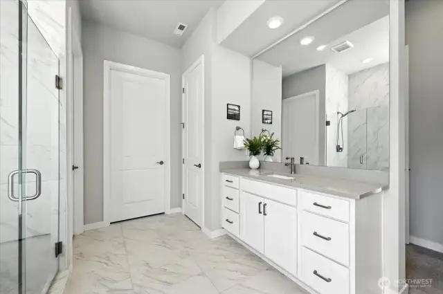 Quartz counters with elevated bath faucets and accessories
