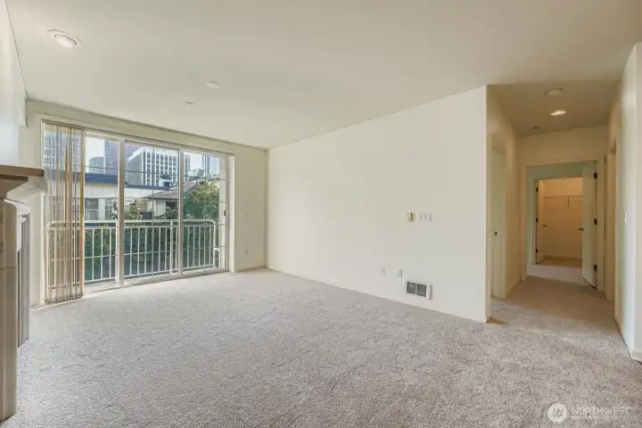 Private balcony creates seamless indoor/outdoor living.