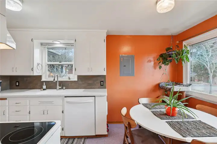 Updated kitchen with dining space.  All of the appliances stay!