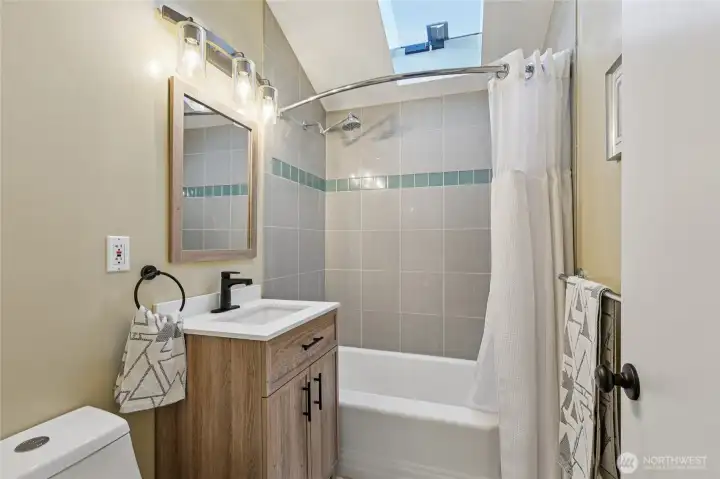 The full bathroom was redone back in 2023.  New vanity, toilet and floor.